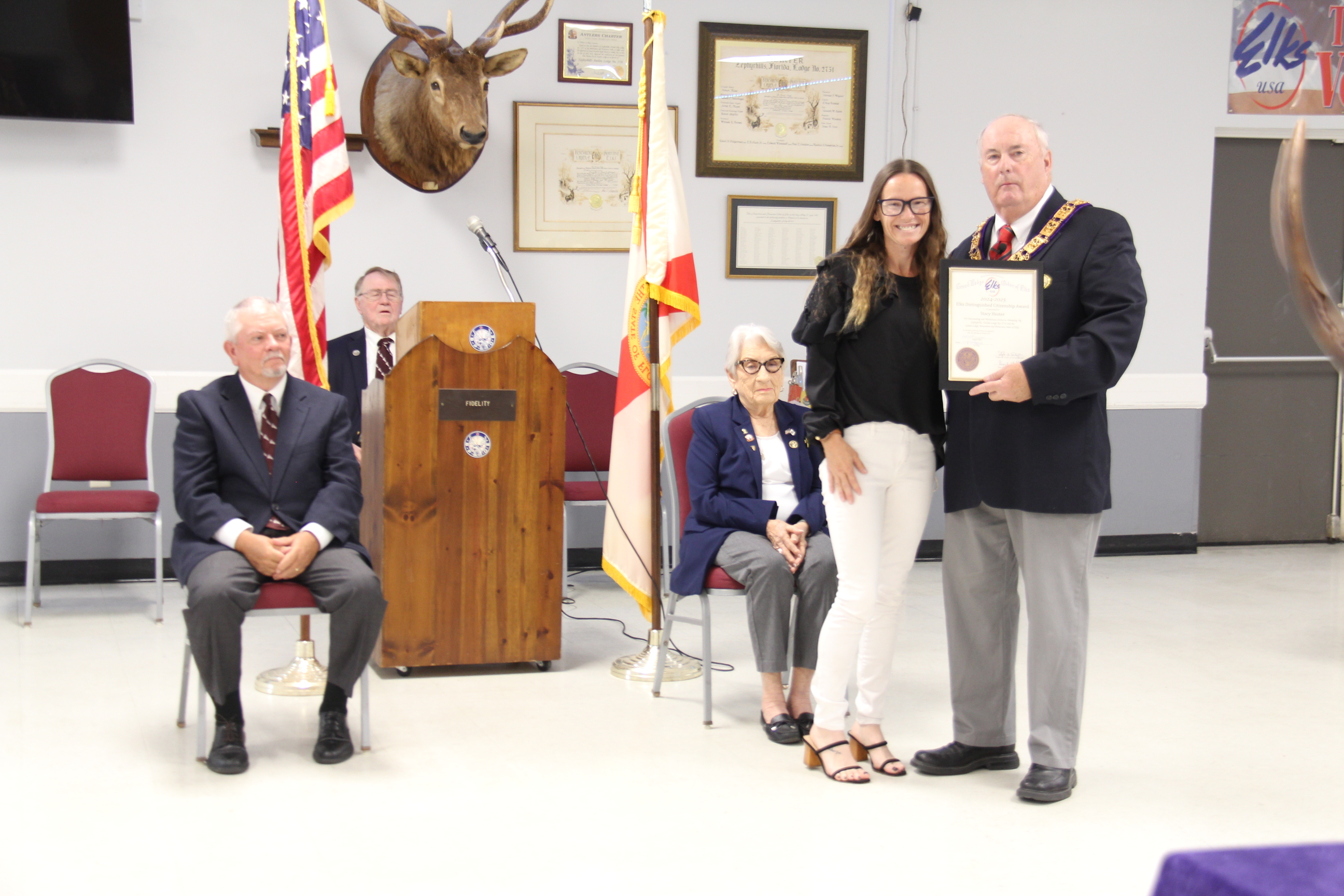 Stacy Hester of Solo Moms Recovery and Healing was awarded the Citizen of the Year Award from Exalted Ruler, Zephyrhills Elks Lodge, Karl Finnemore. Bill Morehouse, Mike Ritchie and Anne MacDonald, officers seated.